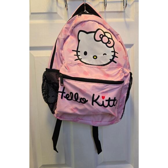 Hello Kitty Other - Hello kitty backpack- New light pink zipper pocket in front, drink Holders side
